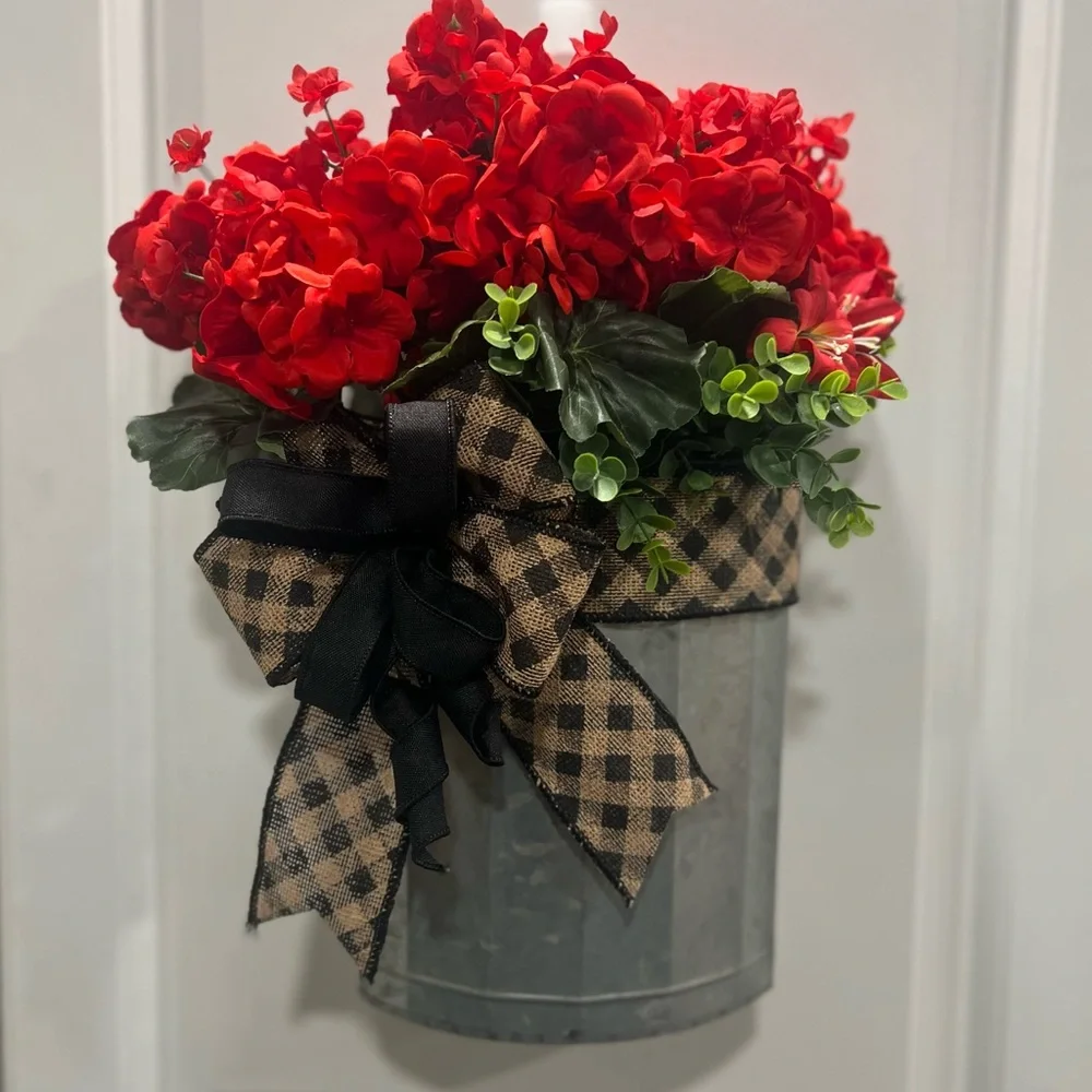 Red Floral Arrangement in Metal Bucket